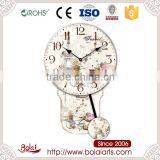 Unique Properties Floral Dial and Bicycle Design Quartz Pendulum Wall Clock thumbnail-1