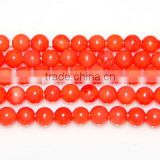 5-6mm round orange coral beads