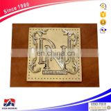 The Chinese manufacturers wholesale custom leather patches, leather label jeans leather patch label
