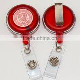 red transparent retractable cable reel