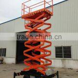 7.4 Meters Mobile Scissor Lift Platform Inside Building thumbnail-1