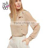 HAODUOYI Fashion Light Kahaki Women Blouse Neckline Lace-up Side Buttons Semi-sheer Lantern Sleeve Lady Tops for Wholesale thumbnail-1