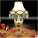 Gold outline home goods ceramic vase table lamp in bedroom