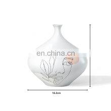 Modern Nordic Desigh Abstract Face Porcelain Ceramic Flower Vase For Home Decor thumbnail-2