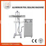 Aluminum foil sealing machine