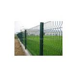 curved green wire mesh fence