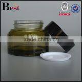 30g 50g Hot Products Fancy Green Glass Cosmetic Jar High Quality Oblique Shoulder Empty Glass Jar With Black Lid China Suppliers thumbnail-2