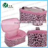 A glittered cosmetic bag that features leopard spots zipper cosmetic storage bag