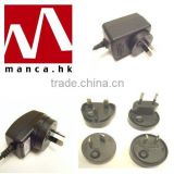 Manca. HK--Interchangeable AC Plug Switching Power Supplies
