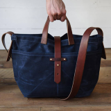 navy blue waxed canvas crossbody bag with long shoulder