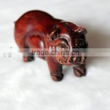 Artistic sandalwood carving pig