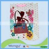 Cheap Middle Glitter Valentine's Gift Paper Bag With Ribbon Handle Supplier and Manufacture thumbnail-1