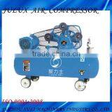 Low noise piston air compressor for tyre