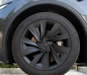 19 Inch Matte Black Wheel Hub Cover for Tesla Model Y 2025 – Flickering Shadows Style Juniper thumbnail-2