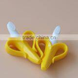 FDA Hot sale silicone material baby toothbrush,banana shape baby teether