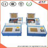 Mini CO2 Laser Engraving Machine 250*250mm/300*300mm With Honey Comb Working Table Infrared Positioning System ZK-2525