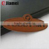 China Manufacturer Cheap Wholesale Jeans Brown Leather Patch
