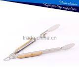 Hihg Quality Kitchen Utensils Tongs and BBQ Grill Stainless Steel Tongs With Wooden Handle thumbnail-3