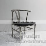 vintage industrial tubular metal frame chair with modern leather seat