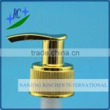 Lotion pump with gold coating