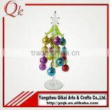 Nice Looking Glass Christmas Tree With Colorful Pendants