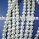 White Round Freshwater Pearl Strand thumbnail-1