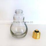 Antique Lamp Bulb Glass Oil Bottle With Lid thumbnail-2