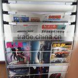 Metal Newspaper Rack With Wheels thumbnail-1