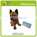 Small rubber dog toy with BB wlistle