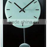 Glass pendulum wall clock