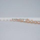 New 8-9mm Pink Rice Shape Freshwater Pearl Strand Wholesale thumbnail-1