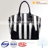 China factory black and white striped handbag ,lady PU leather handbag with tassels