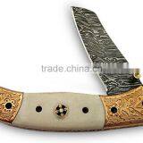 A HANDMADE ENGRAVED COPPER BOLSTERS WITH WHITE G-10 HANDLE, DAMASCUS STEEL LINER LOCK FOLDING KNIFE thumbnail-1