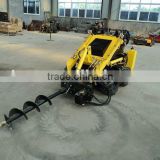 Mini skid loader with hole digger