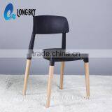 LS-4006 Hot Selling Cheap Elegant Design Wood Legs Plastic Stacking Chair thumbnail-1