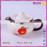 White Small Ceramic Apple Decal Desgin Manual Juicer thumbnail-1