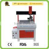 2015 Jinan High Quality T-slot Table 6090 Cheap Price Mini Ball Screw 3 Axis Cnc Carving Machine Router