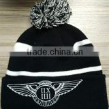Customize acrylic cheap knitted beanies embroidery faux fur pom beanie wholesale