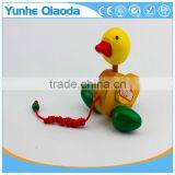 Colorful Pull Along Duck Wooden Toy as You Pull They Make a a Fun Baby thumbnail-1