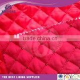 100% polyester oil cire waterproof quilting fabric,diamond design quilted fabric,quilted down coat lining fabric