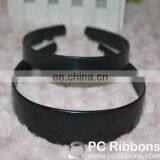 Black plastic headband