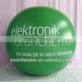 green helium advertising balloon