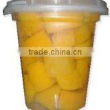 canned yellow peach with cup