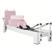 White Painted Oak Pink Pilates Reformer