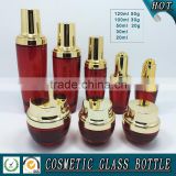 Red colored glass cosmetic bottle packaging and cosmetics cream empty jars