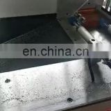 Double-head cutting saw for cutting 45-90 degree aluminum profiles
