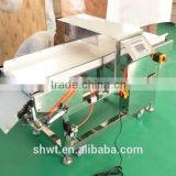 Manufacture metal detector with flap rejector system