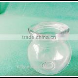 tall round glass pudding bottle for cadlestick or ashtray