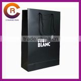 Black printing with glossy lamination white logo paper bags for jeans