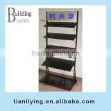 books/carpet display stand